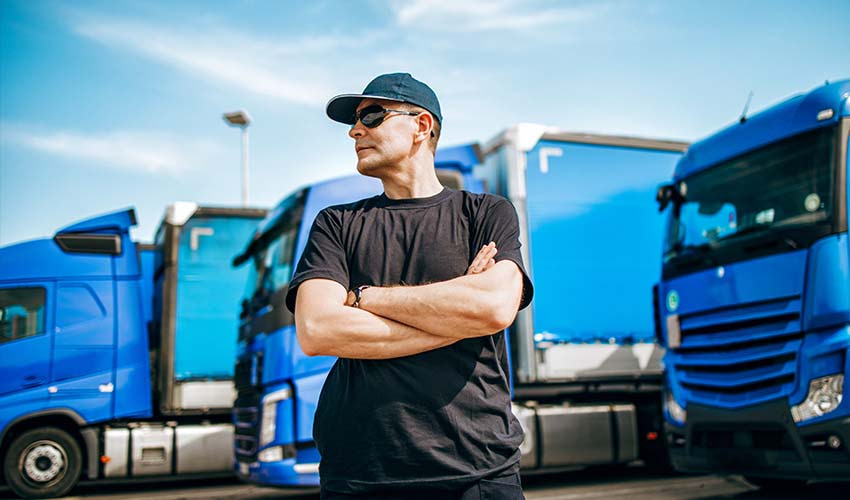 Man infront of Semi truck