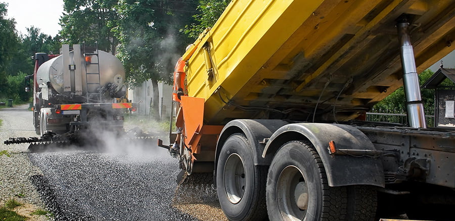 concrete trucks lined up in parking lot