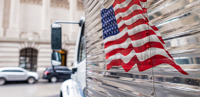 side of a vehicle with an American flag printed on it