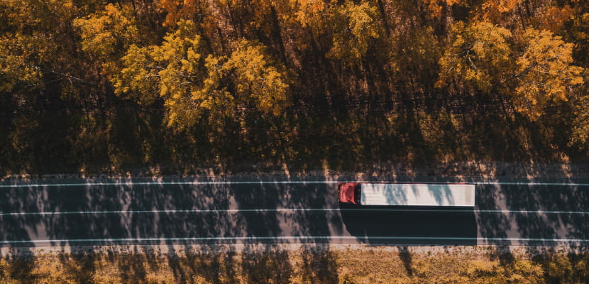 birds eye view of vehicle driving down road