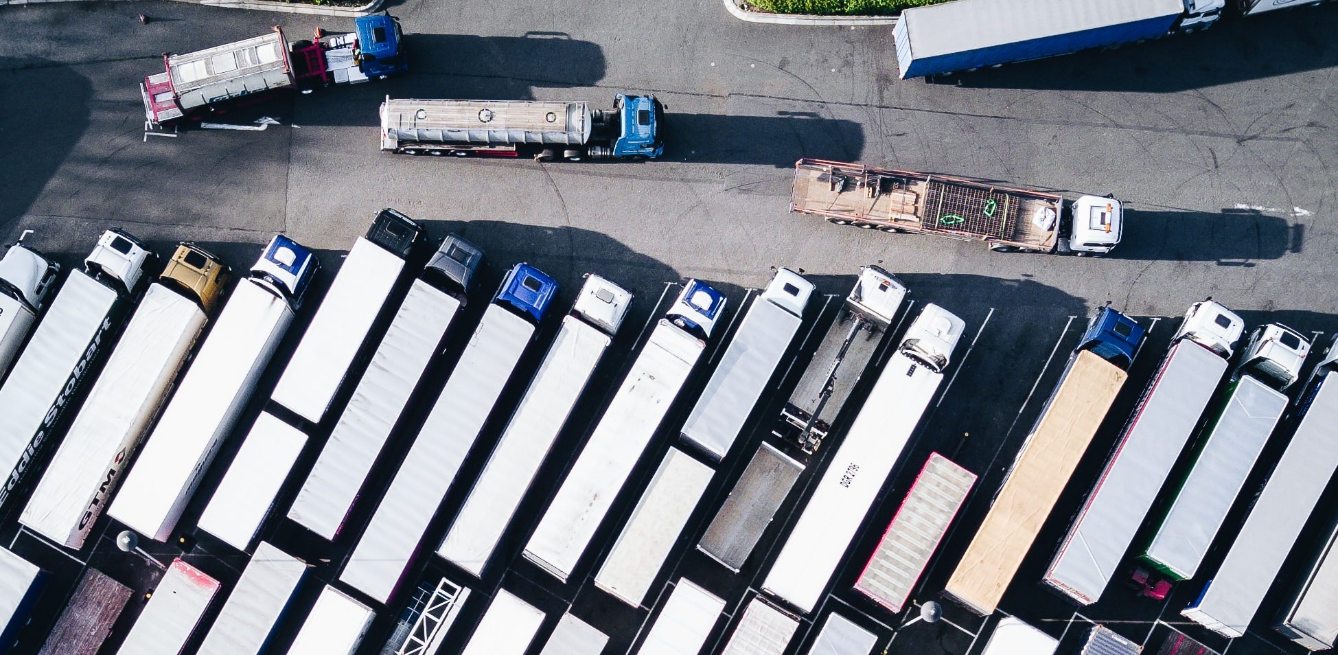 semitrucks in a yard