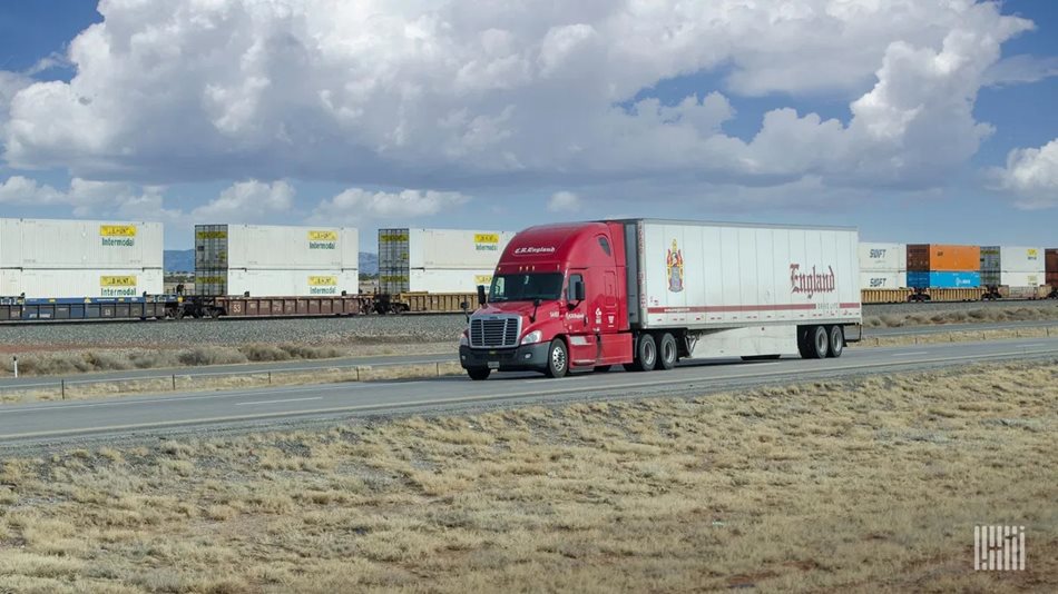 C.R. England semi truck driving on the highway