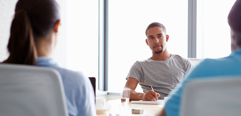 Group of people meeting at a table