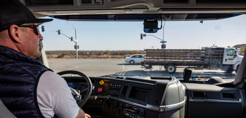 driver in the cab of a vehicle