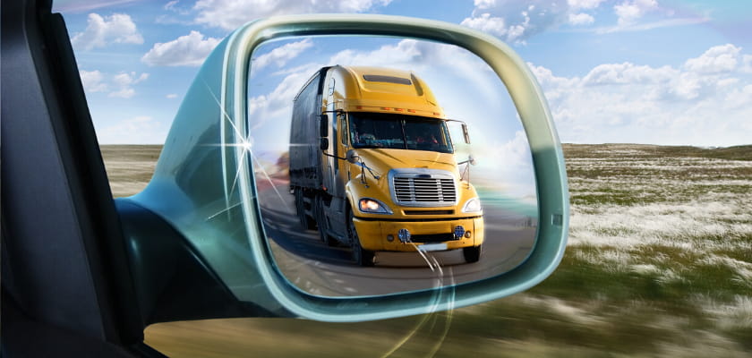 vehicle side mirror with vehicle in the mirror