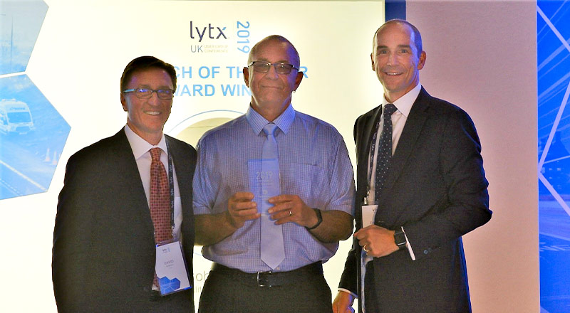 Lytx UK Coach of the Year Winner Bob Willson (center) with David Riordan (L) and Damian Penney (R) from Lytx 