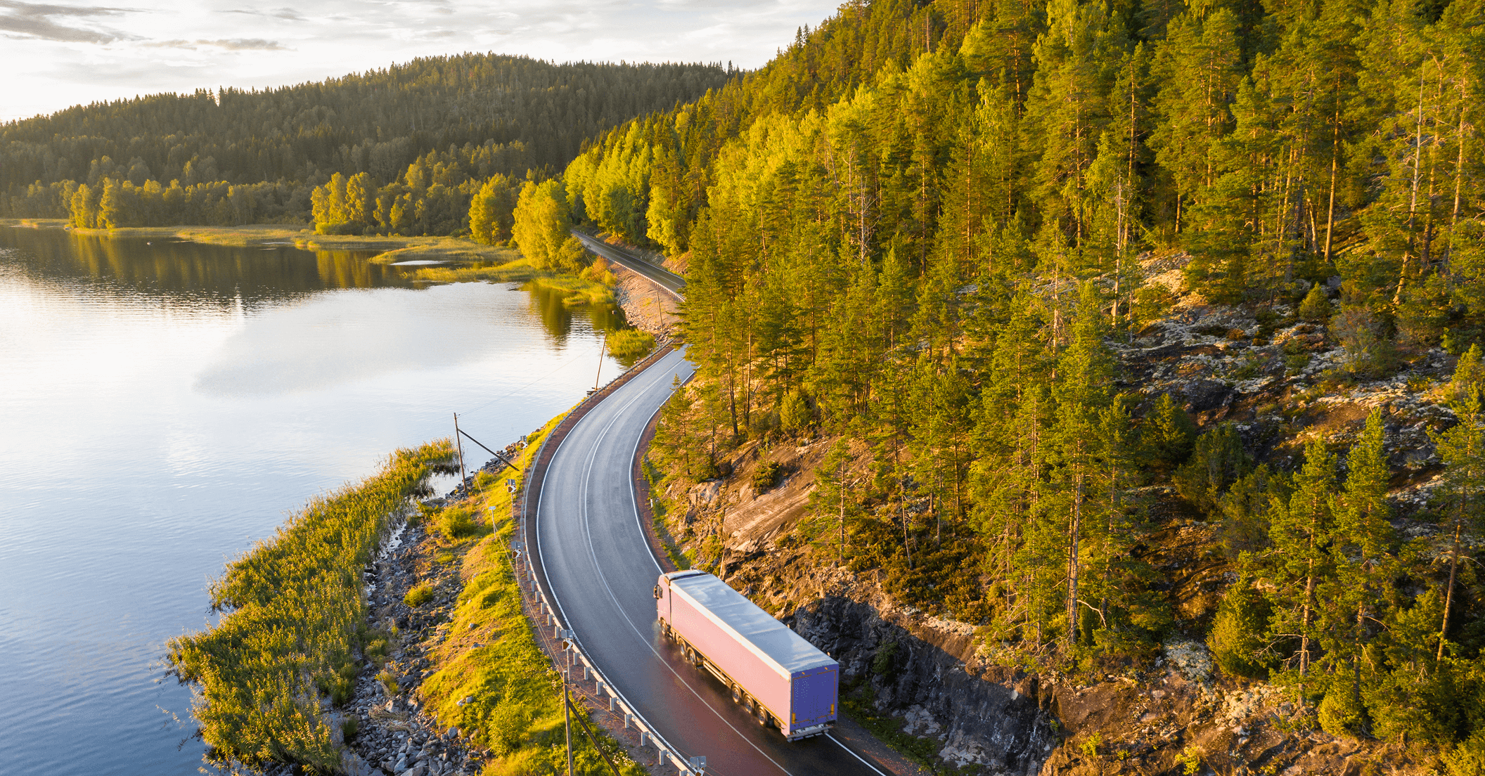 semi truck driving on the freeway