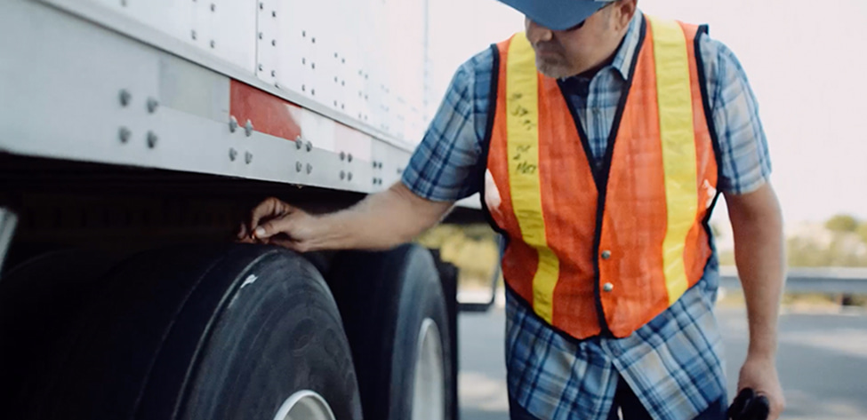 driver conducting a driver vehicle inspection report