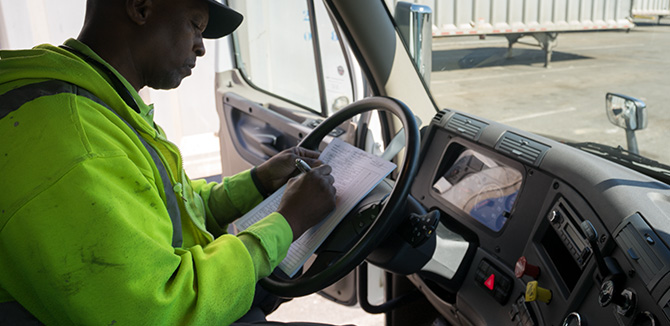 man in commercial vehicle