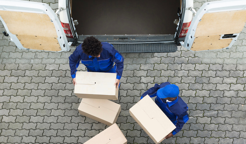 drivers unloading a commercial van