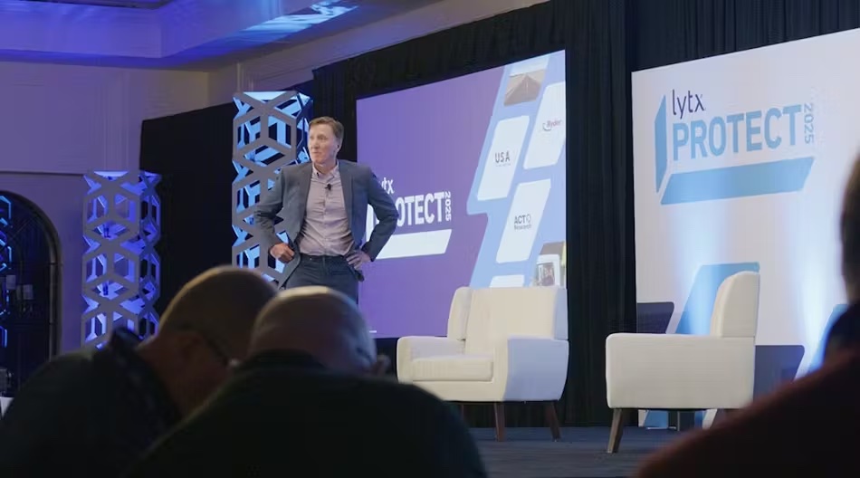 Lytx's Dave Riordan on stage at conference