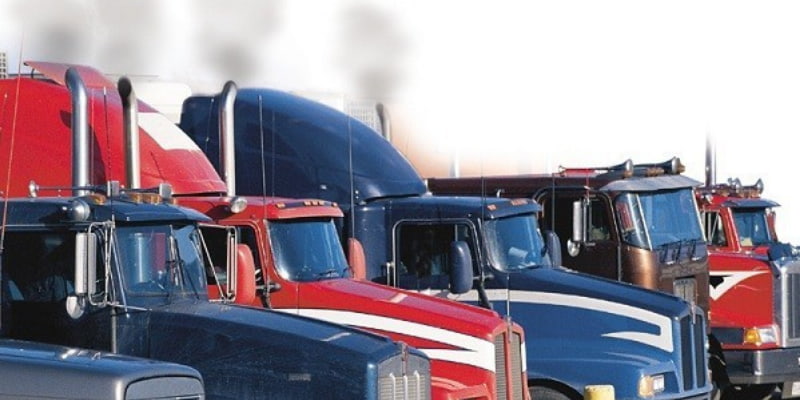 Line up of long haul trucks