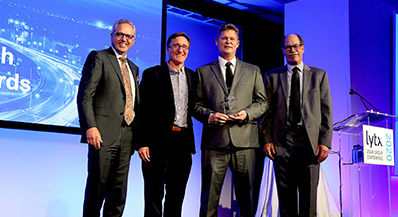 L-R Brandon Nixon, Lytx CEO  • David Riordan, Lytx EVP and Chief Client Officer • Brentt Mackie, Pierce Transit, Coach of the Year • Del Lisk, Lytx VP of Safety Services