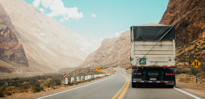 vehicle driving through a canyon